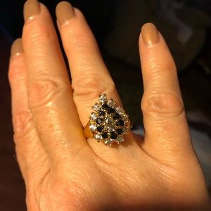 Brand new Pear Shaped ring. Gold tone with CZ and onyx colored stones. Size 8.